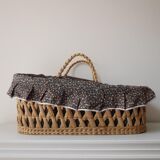 Doll bassinet with its bedding