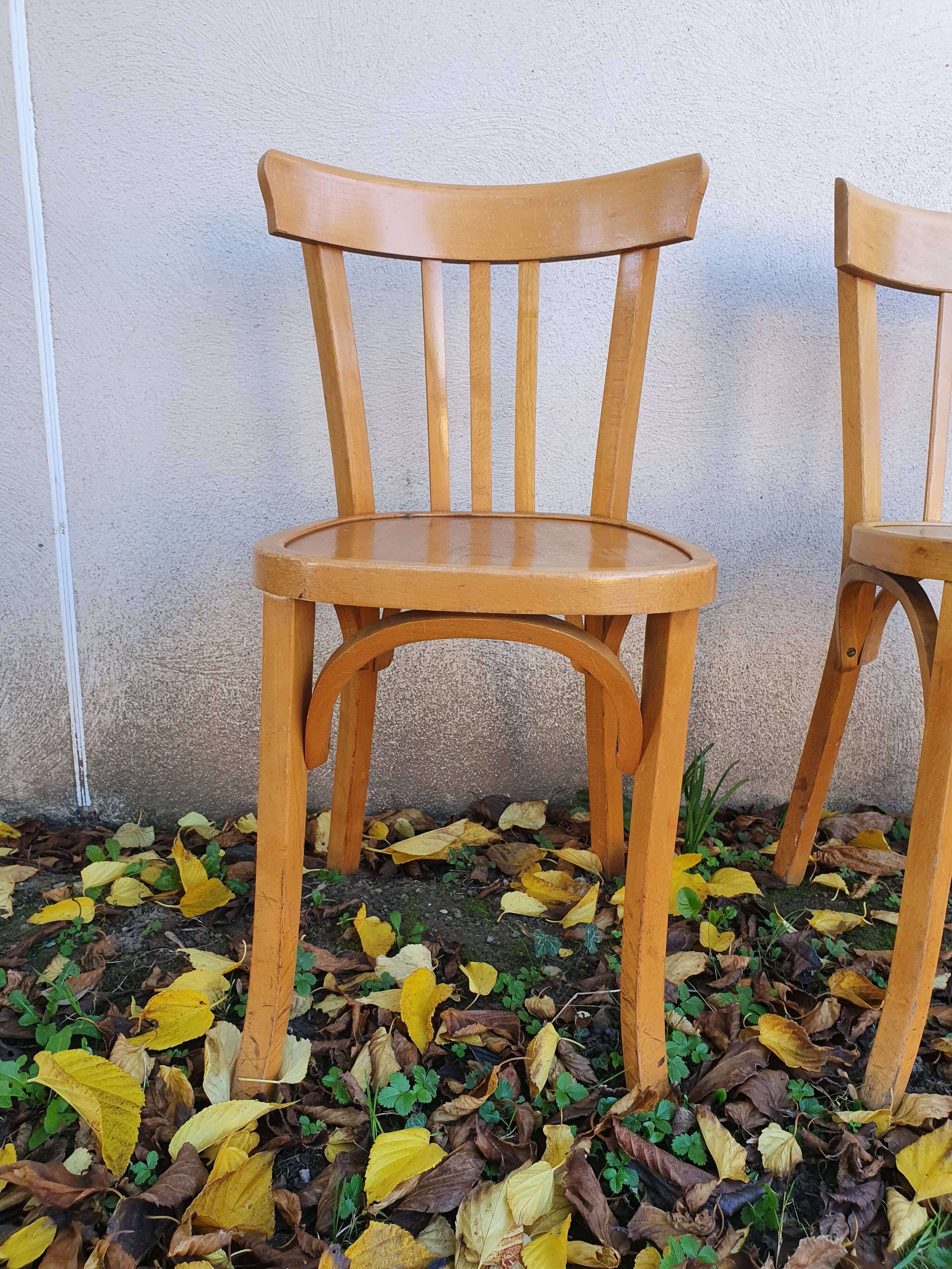 4 bistro chairs stamped Baumann