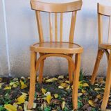 4 chaises de bistrot dont estampillée Baumann