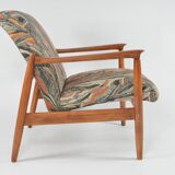 Scandinavian style armchair with terracotta patterns