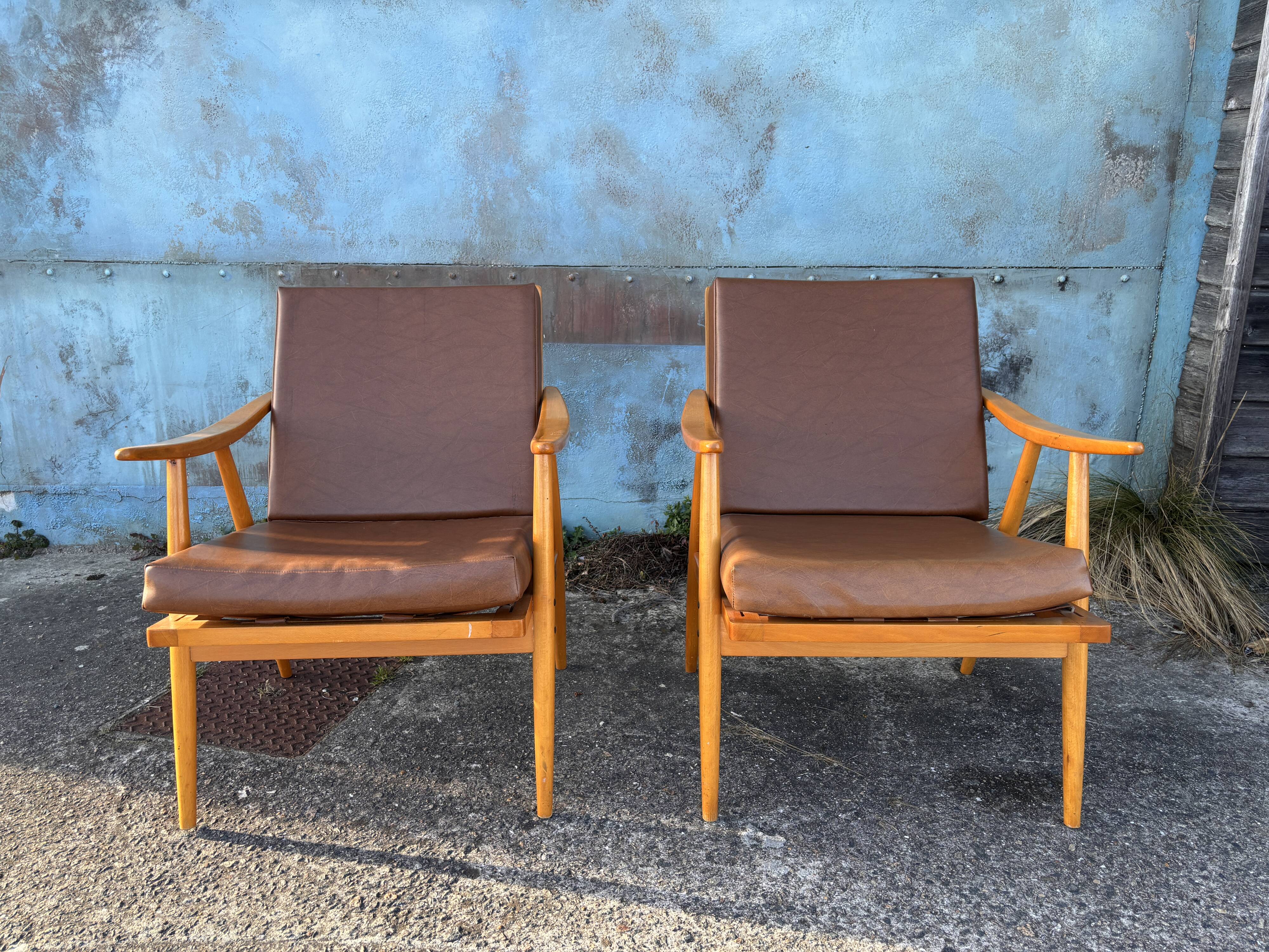 Pair of vintage armchairs with compass legs, "Boomerang" model by THO editions.