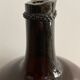 Old amber demijohn
