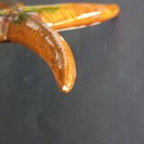 Two vintage ceramic wall pots featuring a seahorse and a starfish.