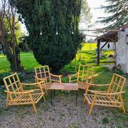 4 bamboo armchairs and a vintage coffee table