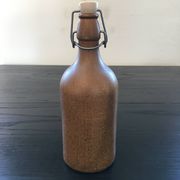 Beige stoneware bottle