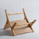 Reclining armchair in natural wood and woven rattan