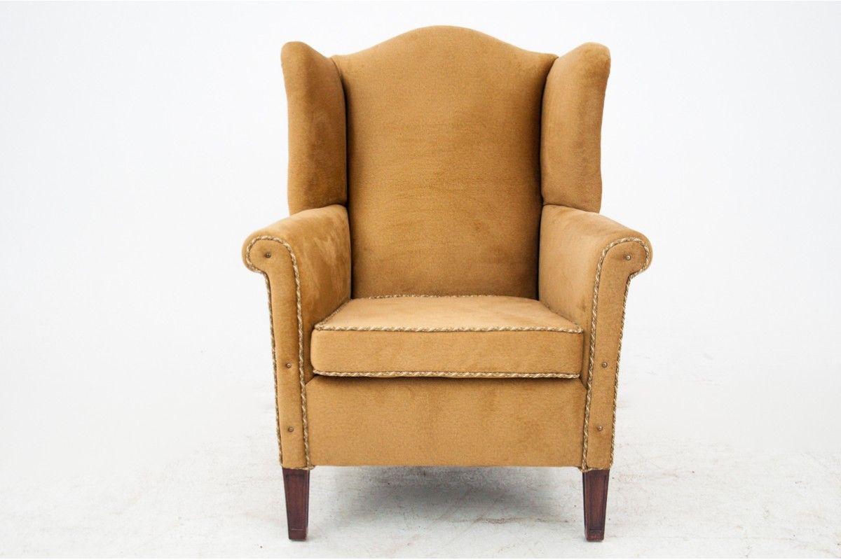 Yellow wingback armchair, Northern Europe, circa 1940s