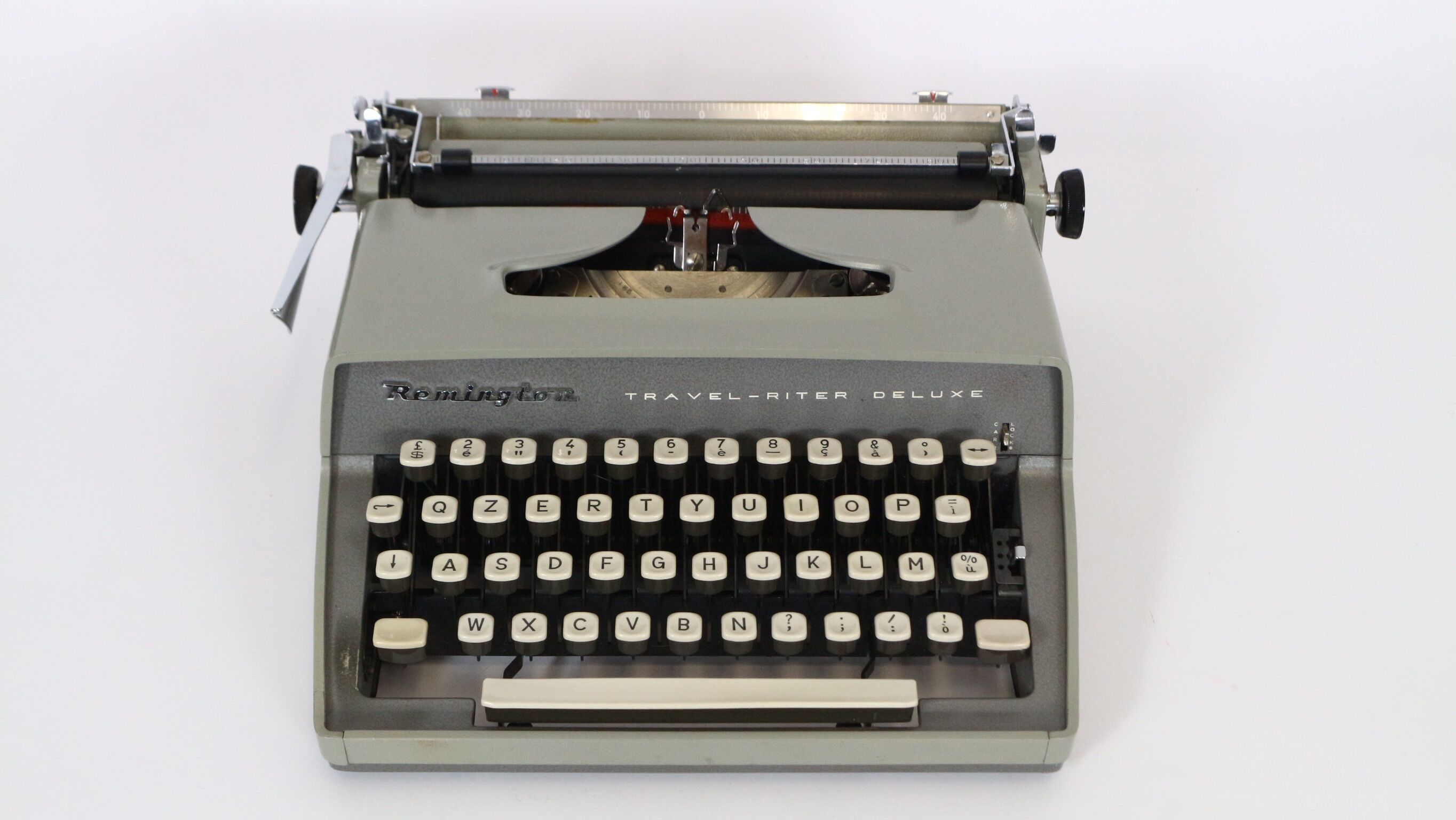 Remington travel-deter Deluxe typewriter with  case