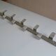 Vintage 70s brushed aluminum metal 12-hook wall coat rack