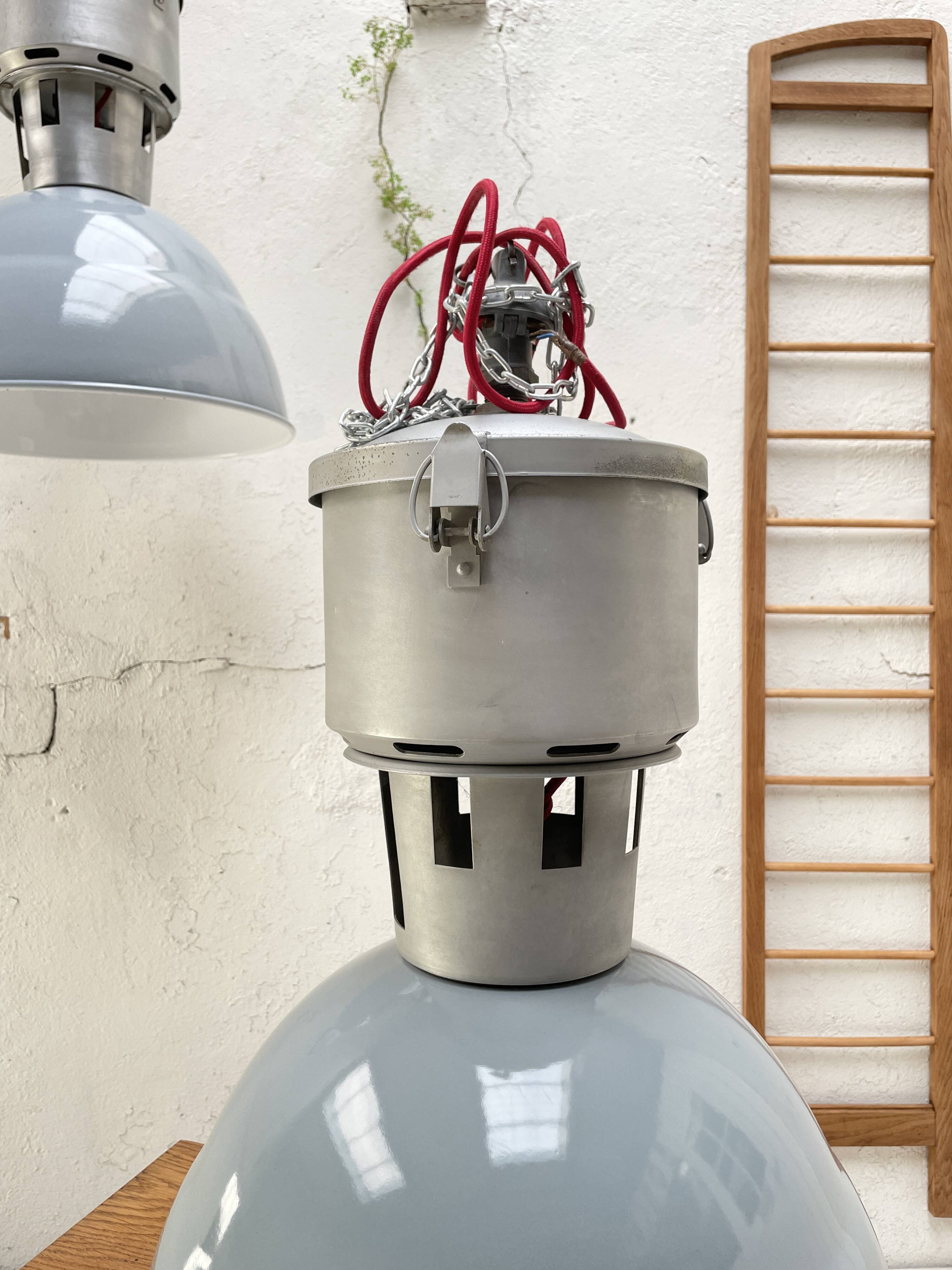 Pair of industrial lamps.