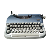 Typewriter blue japy script  with manual and carrying case