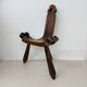 Brutalist hand carved oak Spanish tripod chair , 1970s