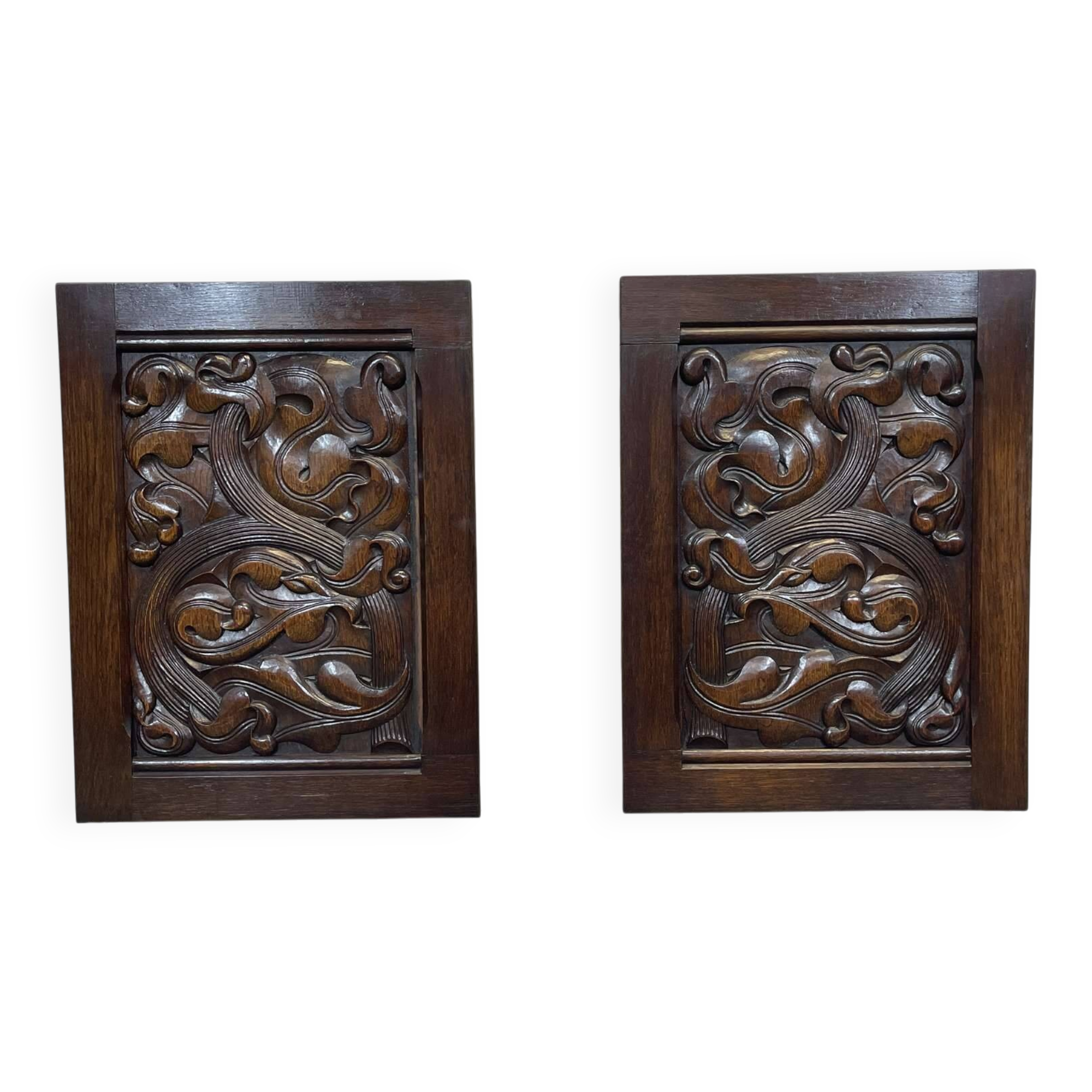 Pair of carved oak panels by Joseph Savina (1901-1983)