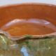 Enamelled clay pan