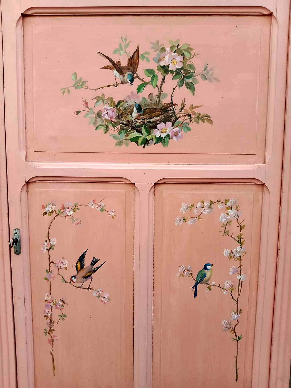 Old pink Parisian cabinet with painted decor
