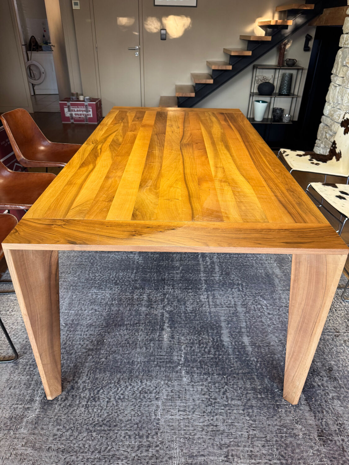 Dining table ligne roset model trapèze in solid walnut with oil finish.