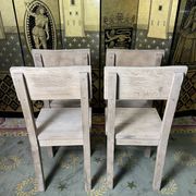 Suite de 4 chaises brutalistes en chêne massif 1950