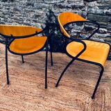 Pair of wooden and black metal chairs