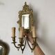 Applique XIXe style Napoléon III en bronze doré avec miroir biseauté