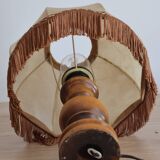 Table lamp in turned wood and umbrella-style leather lampshade