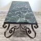 Wrought iron and marble coffee table