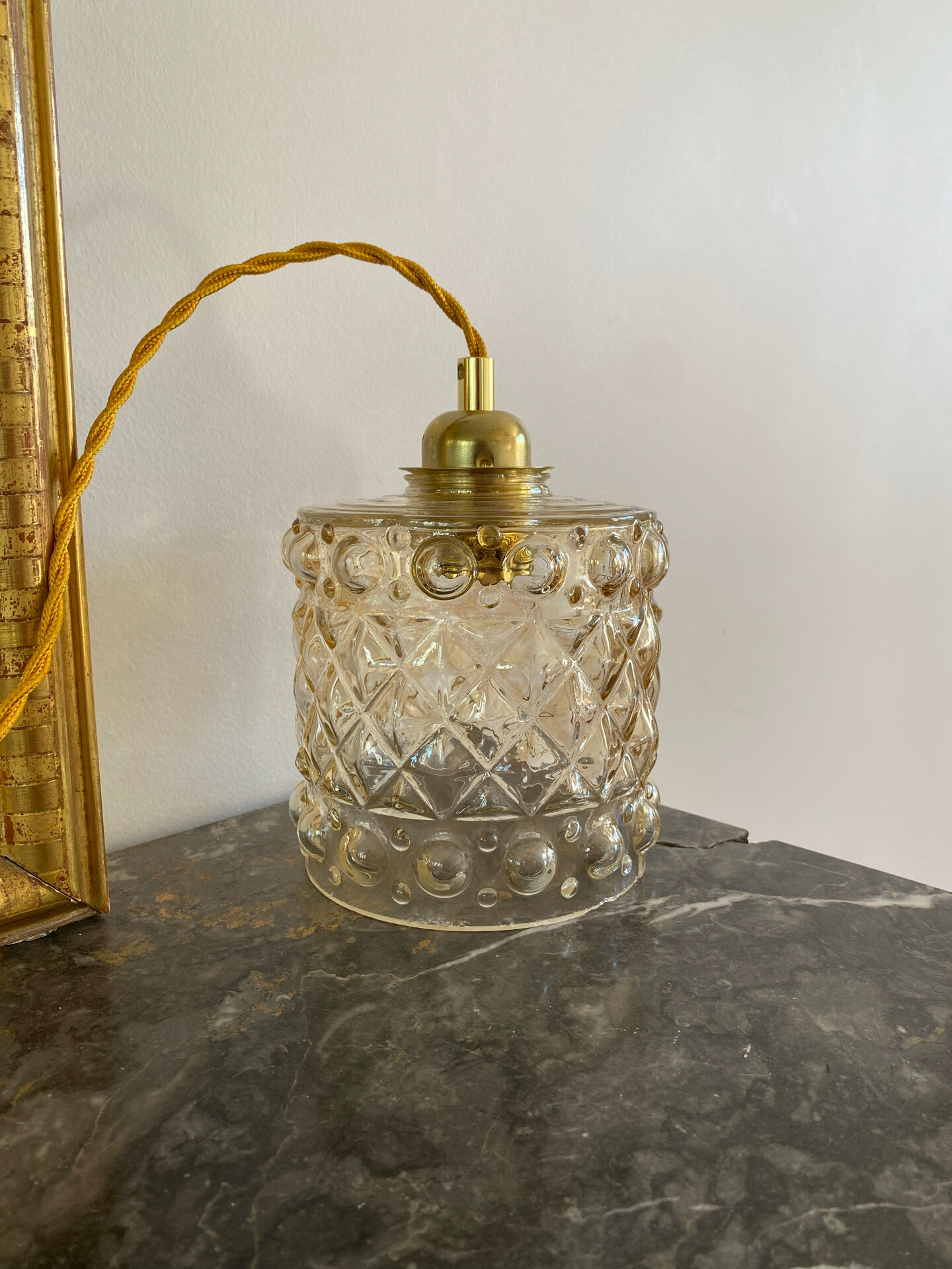 Vintage amber glass suspension globe