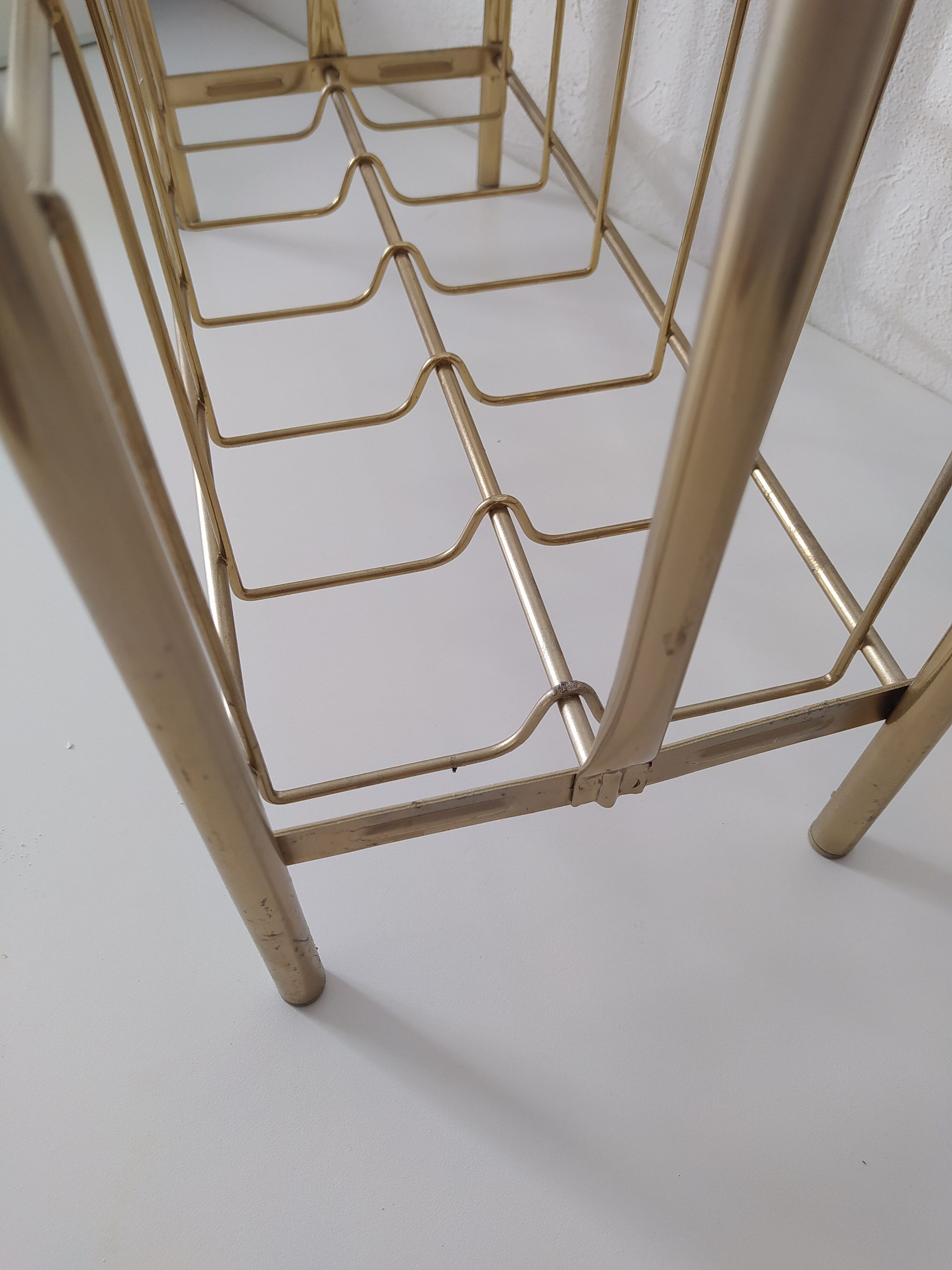 Vintage magazine holder in golden brass