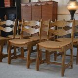 Set of 6 oak dining chairs with rush seat and 'Echelle' backrest in the style of Guillerme et Chambron 1950s