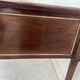 Louis XVI style desk in mahogany and mahogany veneer, 20th century.