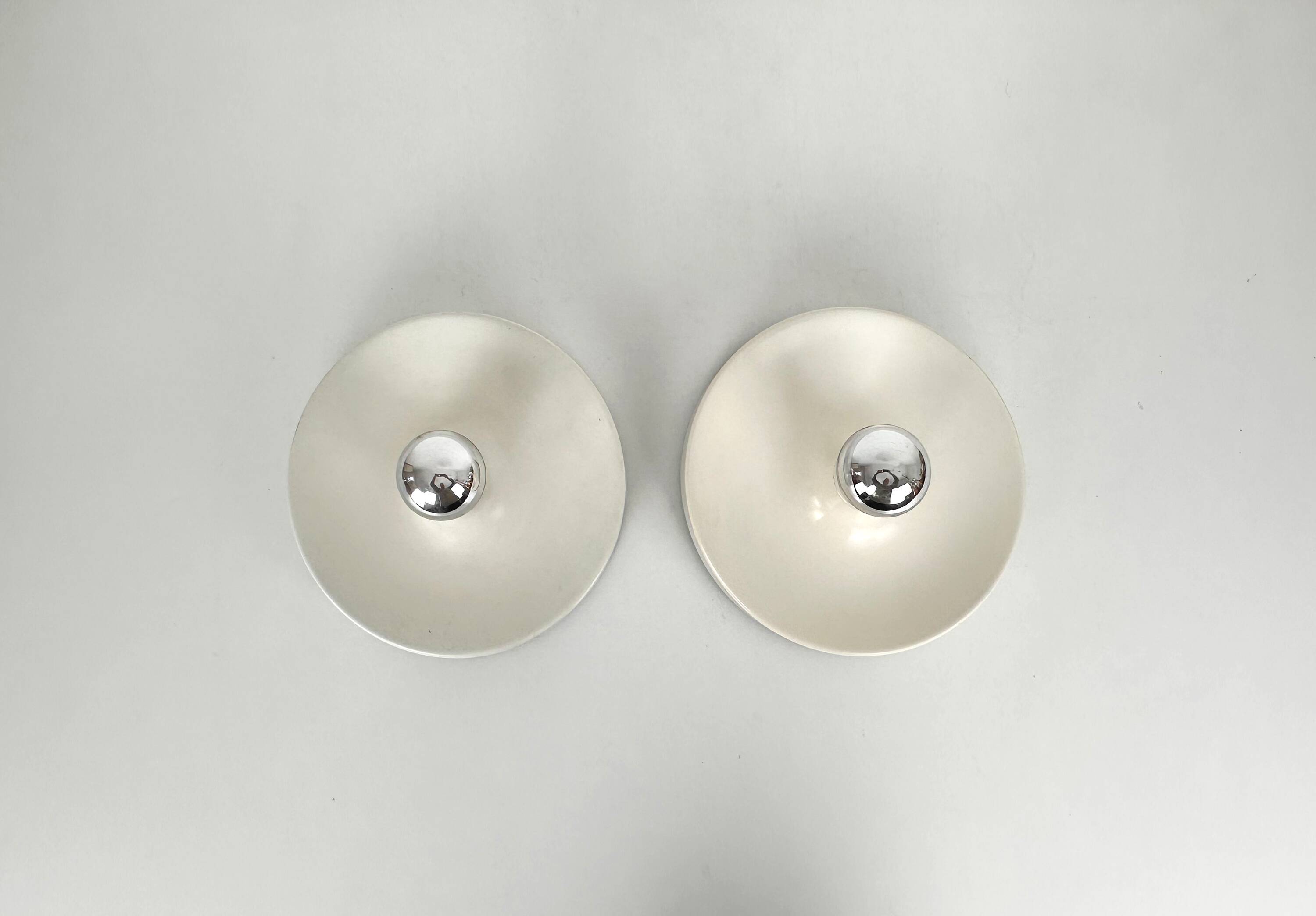 Pair of wall lights selected by Charlotte Perriand, Germany 1960