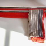 Orange towel rack by Syla from the 70s