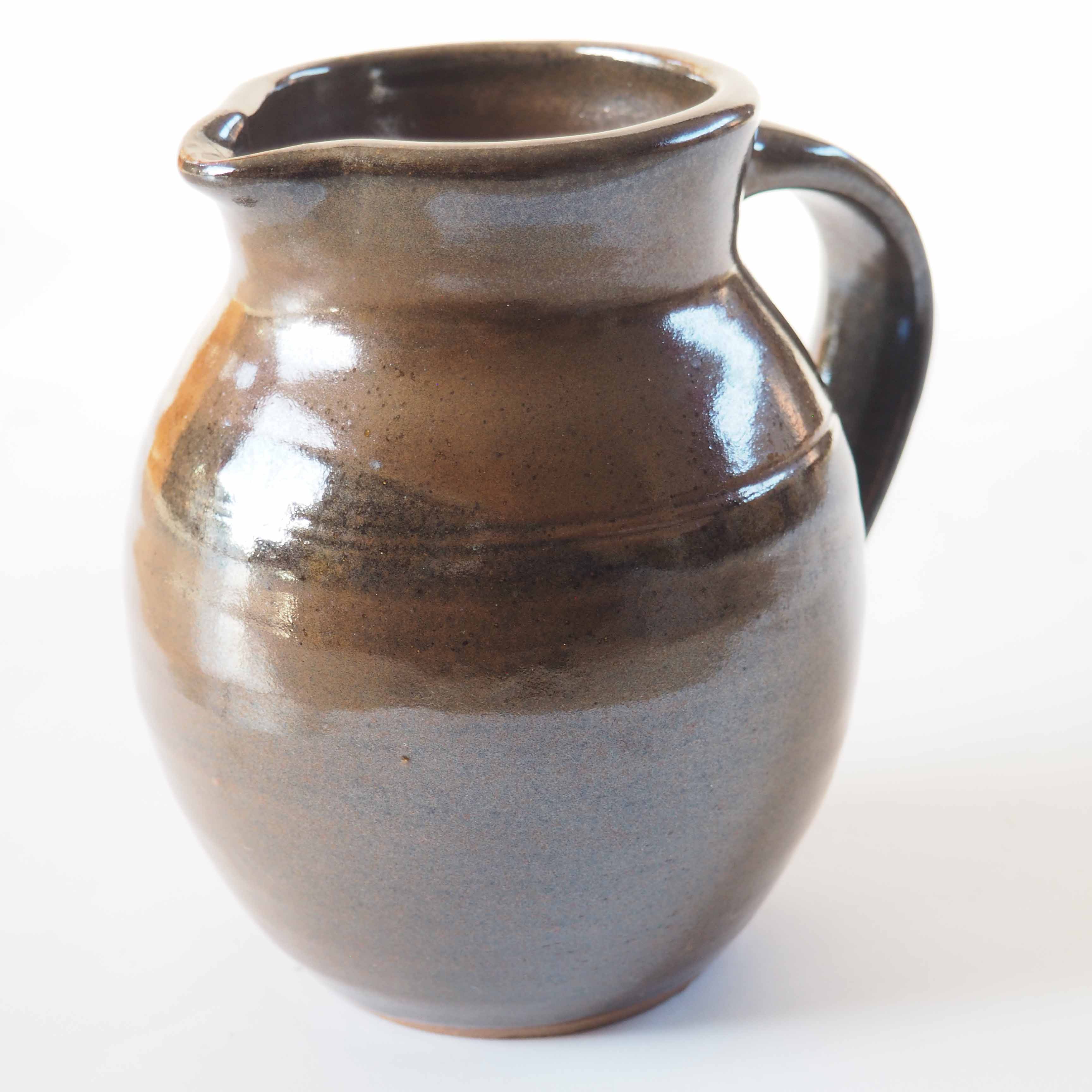 Duo of sandstone pitchers