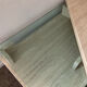 Table basse vintage en travertin et verre