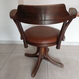 Thonet armchair, swivel, in wood and faux leather.