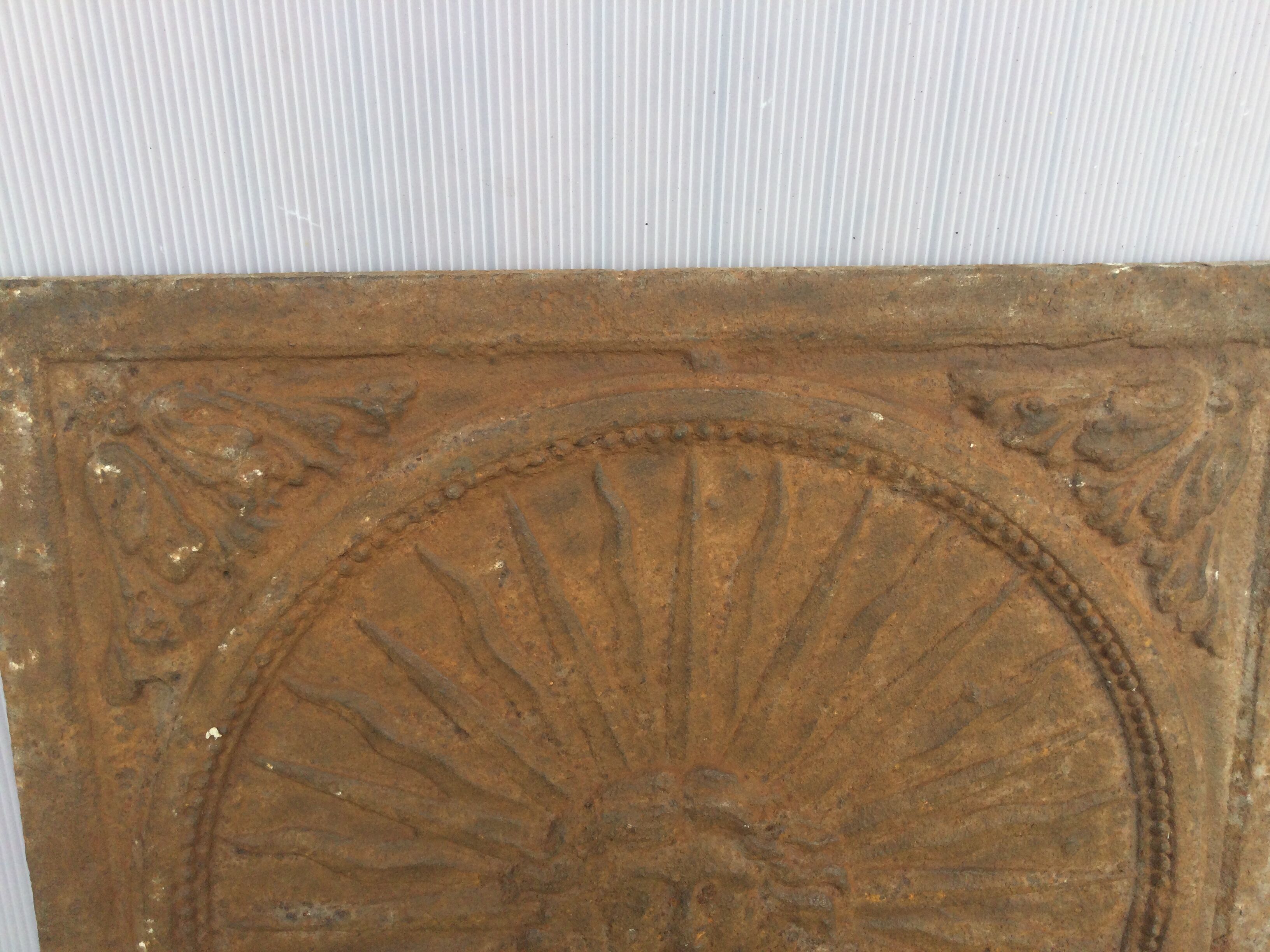 Plaque de cheminée roi soleil
