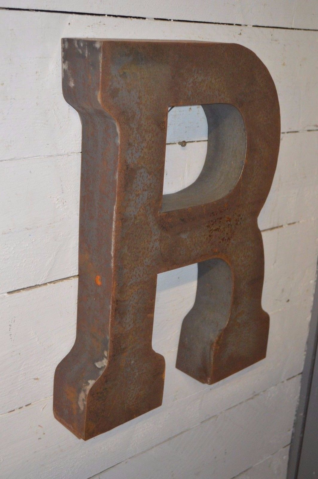 Industrial iron "r" letter