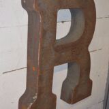 Industrial iron "r" letter