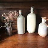 Bottles in varnished sandstone