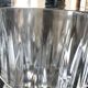 Vintage glass ice bucket stamped with a metal handle