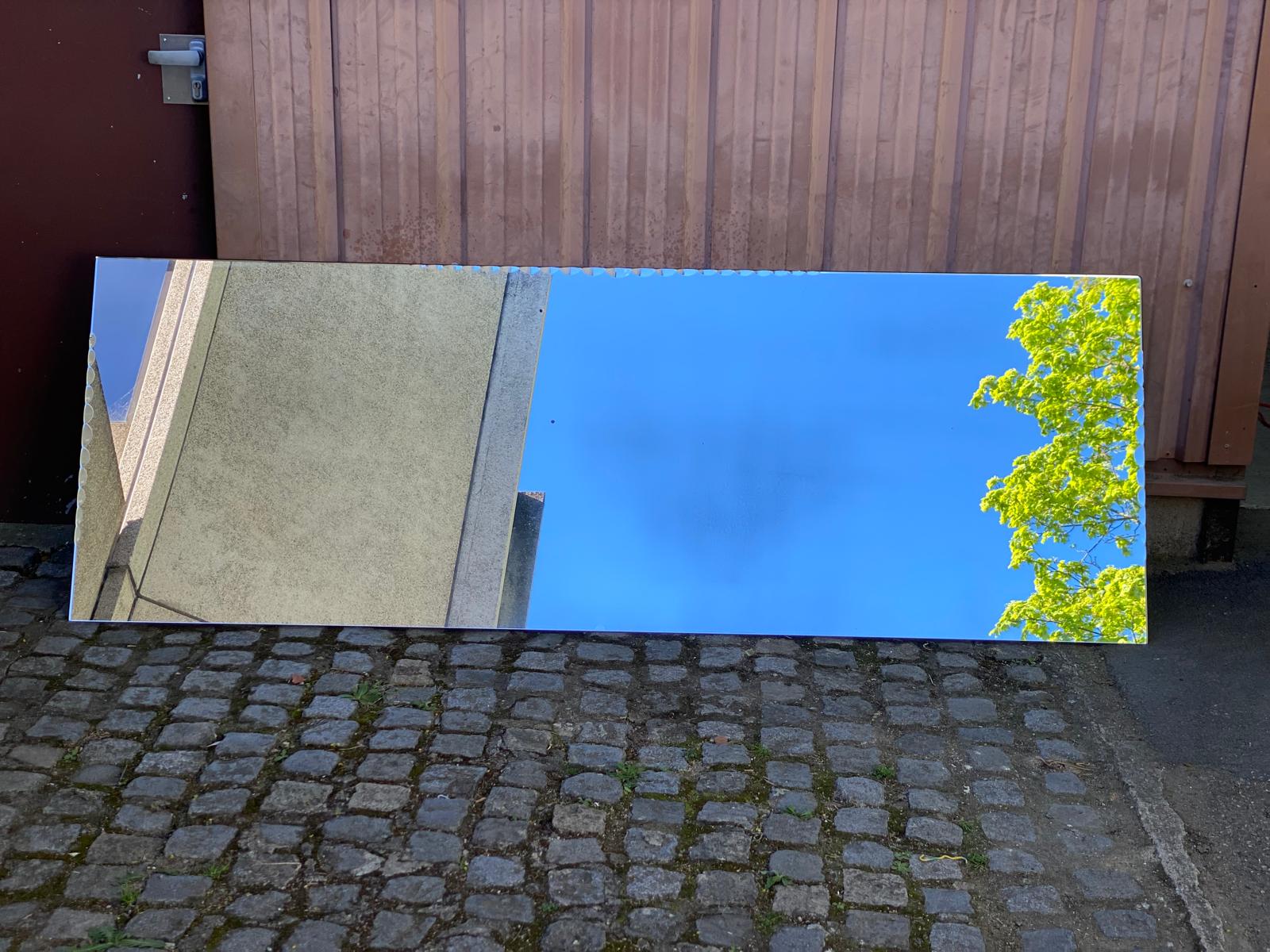 Bistro brasserie mirror, sculpted and bevelled, 1980, 228x80cm.