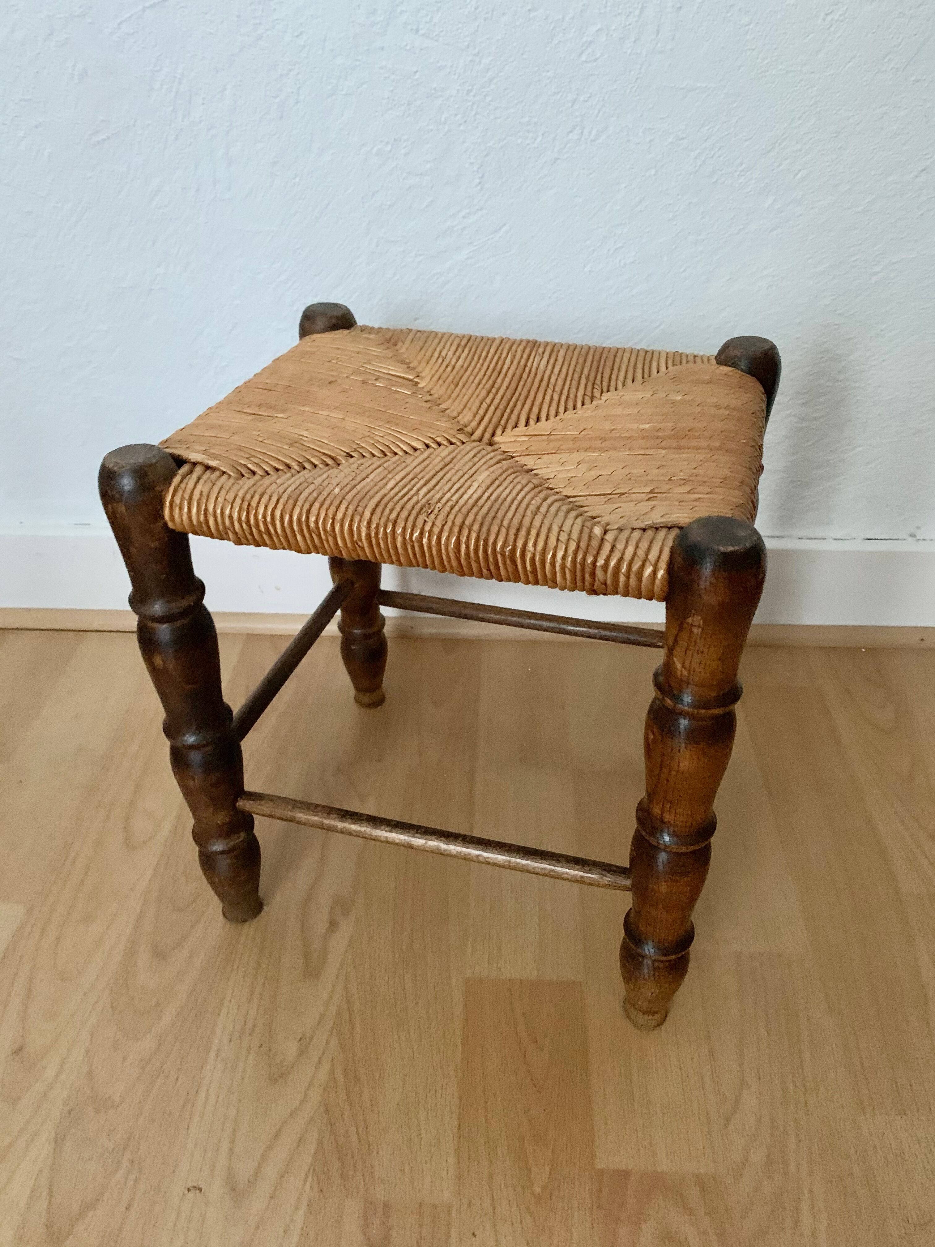 Rests foot wooden stool and wicker