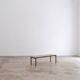 Table basse par Wittmann avec plateau en pierre calcaire.