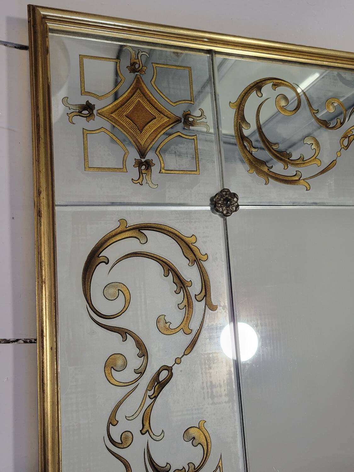 Eglomise brasserie mirror, late 19th century