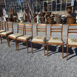 8 chaises en merisier avec assises brodées