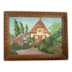 Small painting of a flowered house in oil on cardboard.