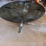 Round coffee table in smoked glass and chrome-plated metal
