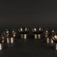 Set of six 1970s amber glass glasses mounted on brushed metal