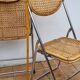 Pair of vintage metal and cane folding chairs