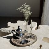 Silver-plated teapot with black handle