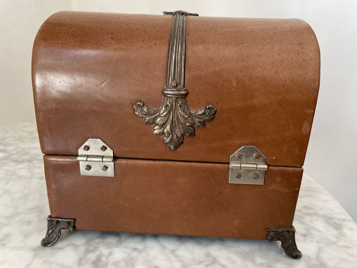 Vintage leather and silver metal jewelry box.